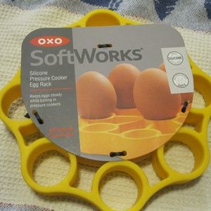 2 Items.  OXO Silicone Pressure Cooker Egg Rack & Egg Slicer.  Lot